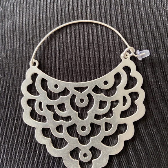 Decorative silver design with hoop closure. 2.75” - Picture 2 of 5